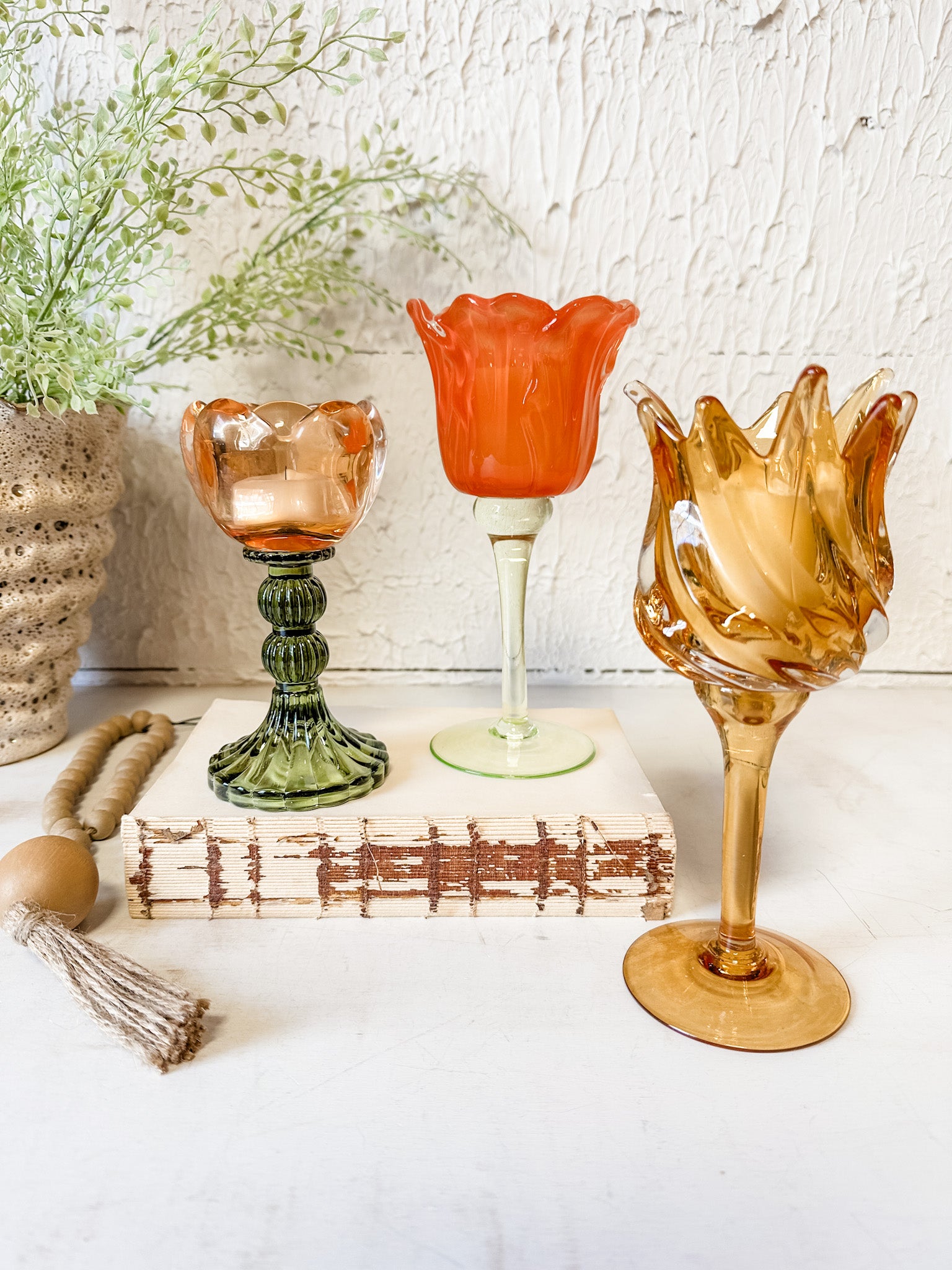 vibrant orange glass tulip votive holder at the rustic barn in killingworth ct