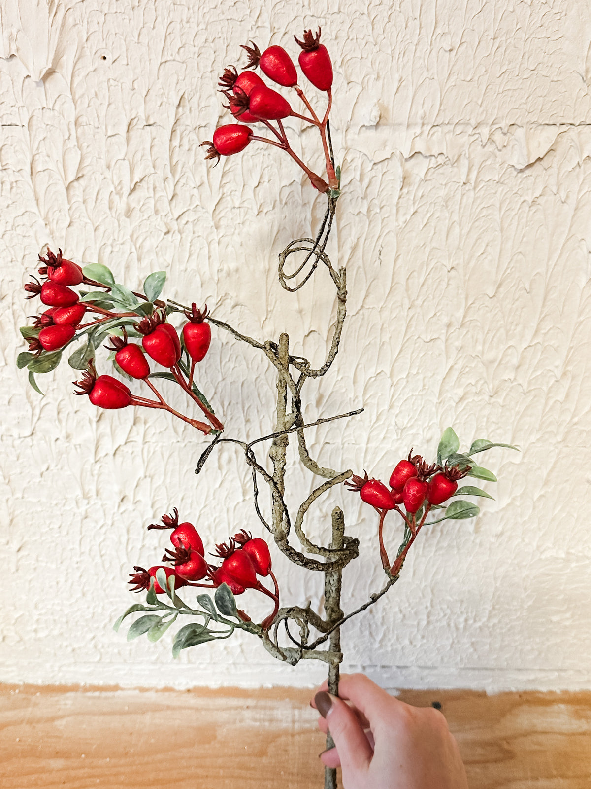Vibrant red rosehips red berry for christmas artificial flowers for sale at the rustic barn in killingworth, CT