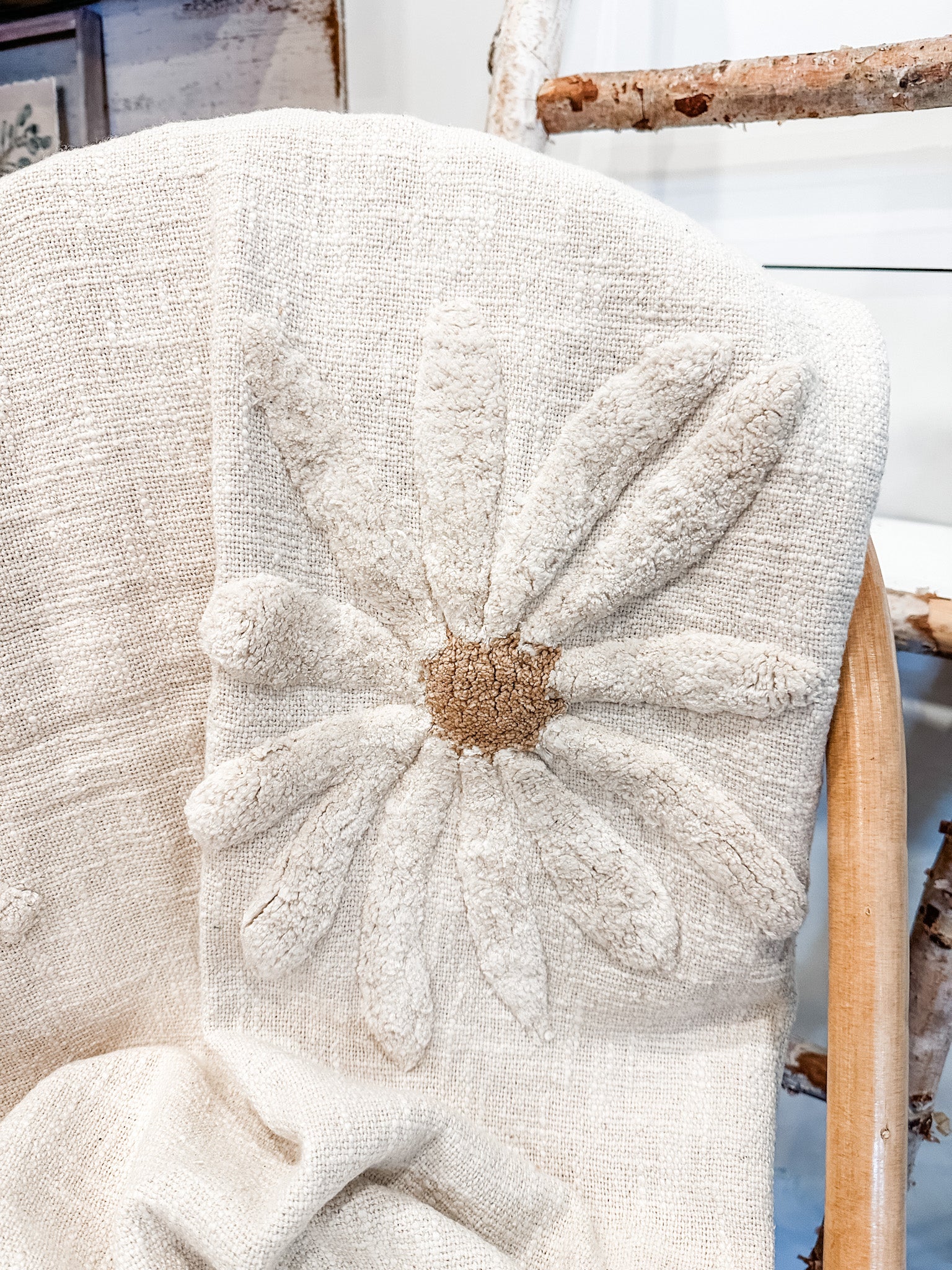 vintage cotton slub cream throw with tufted flowers on it at the rustic barn in killingworth ct