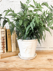 vintage stoneware planter with bow and saucer at the rustic barn in killingworth ct