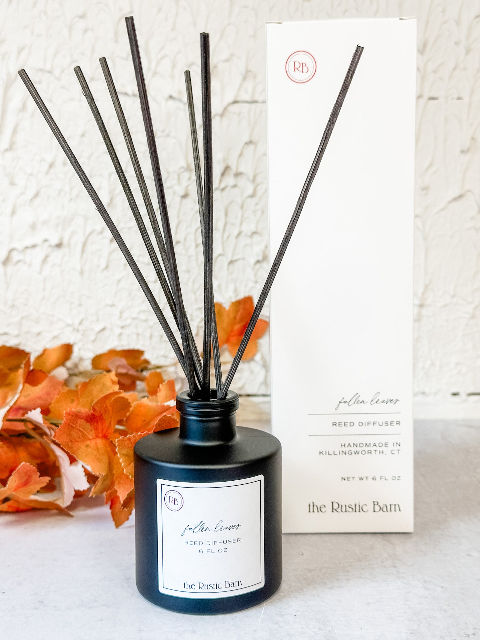 warm cinnamon and autumn wood reed diffuser at the rustic barn in killingworth ct