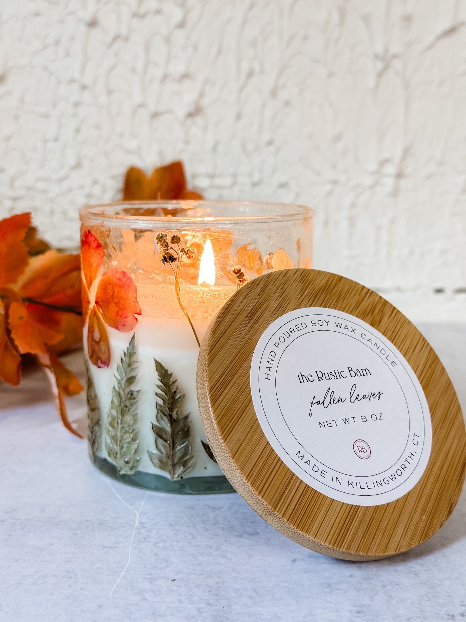 warm cinnamon and autumn woods hand poured soy candle at the rustic barn in killingworth ct