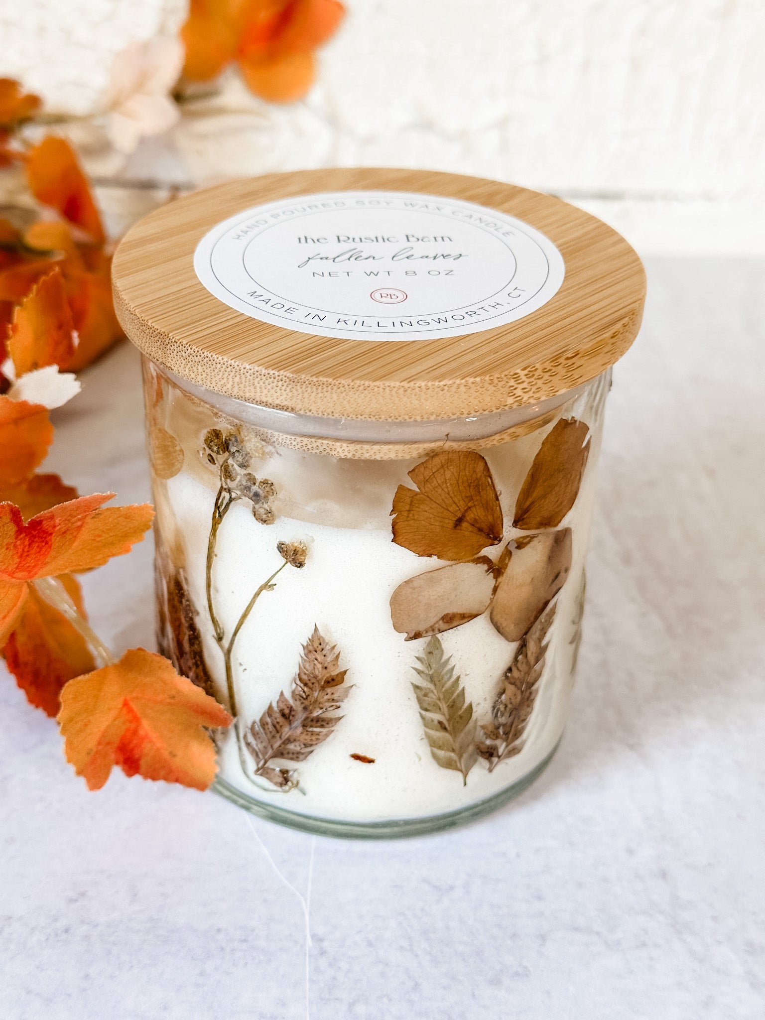 warm cinnamon and autumn woods hand poured soy candle at the rustic barn in killingworth ct