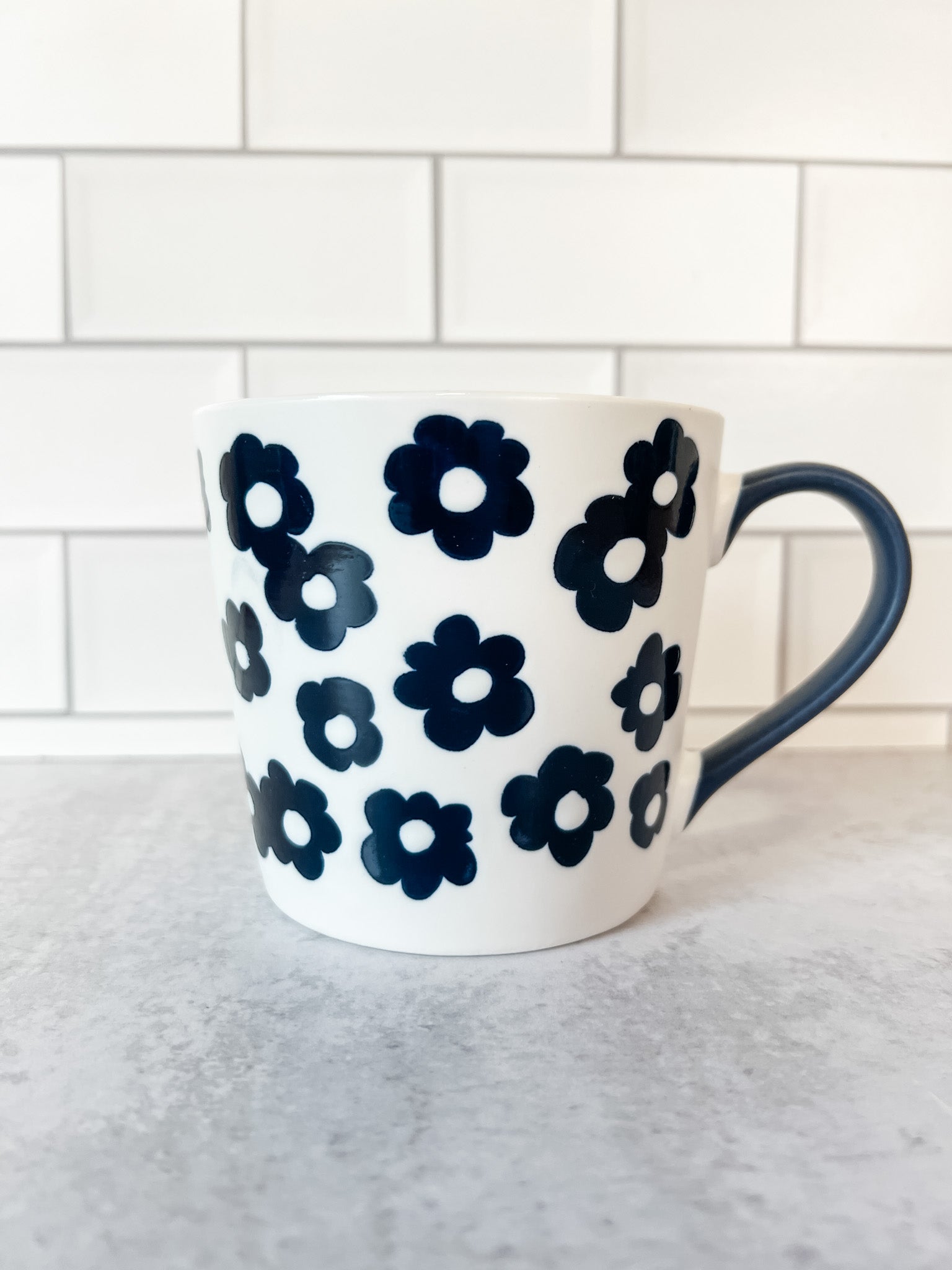 white and navy floral bone china mug at the rustic barn in killingworth ct