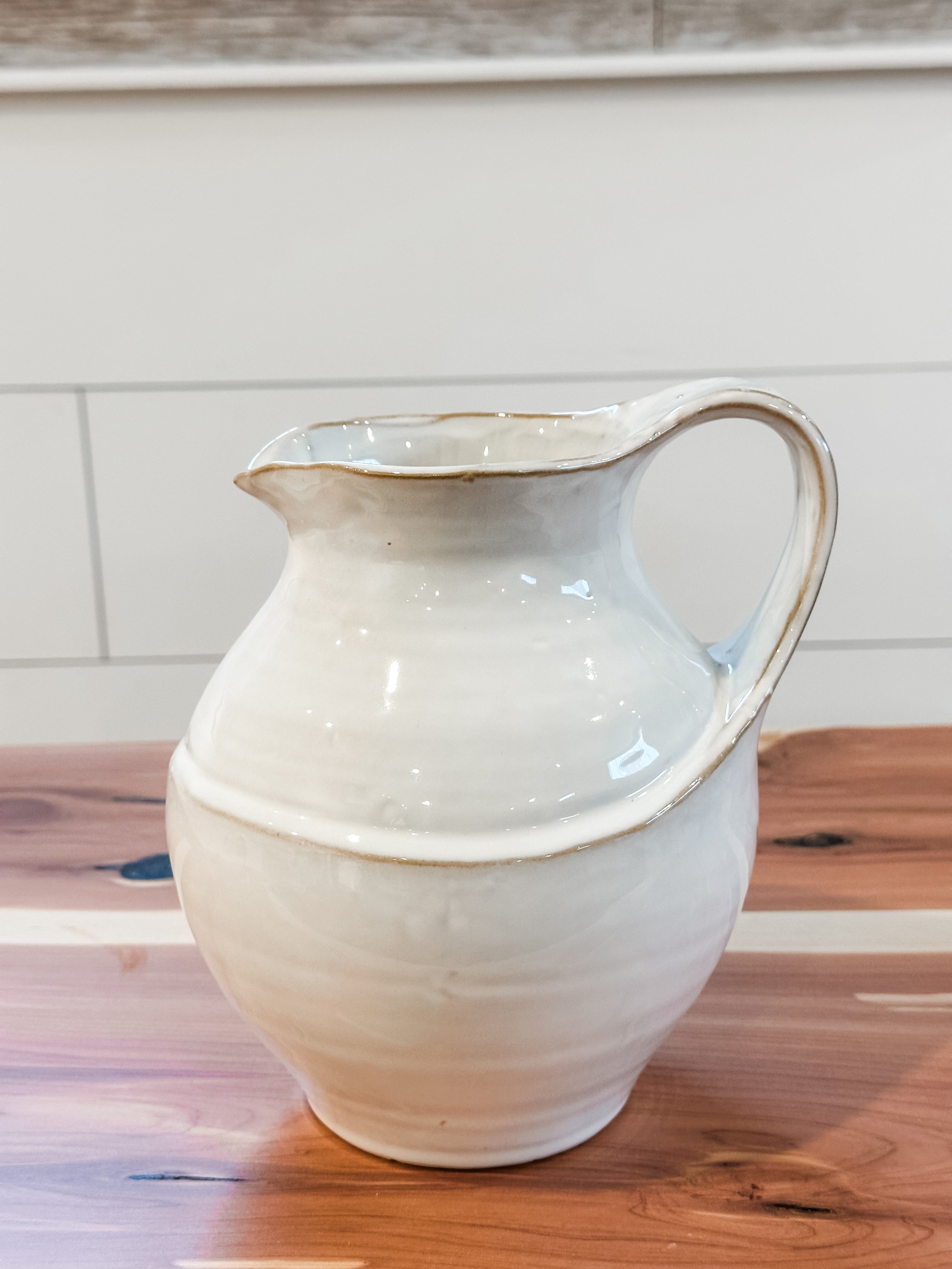 white ceramic decorative pitcher at The Rustic Barn in Killingworth, CT