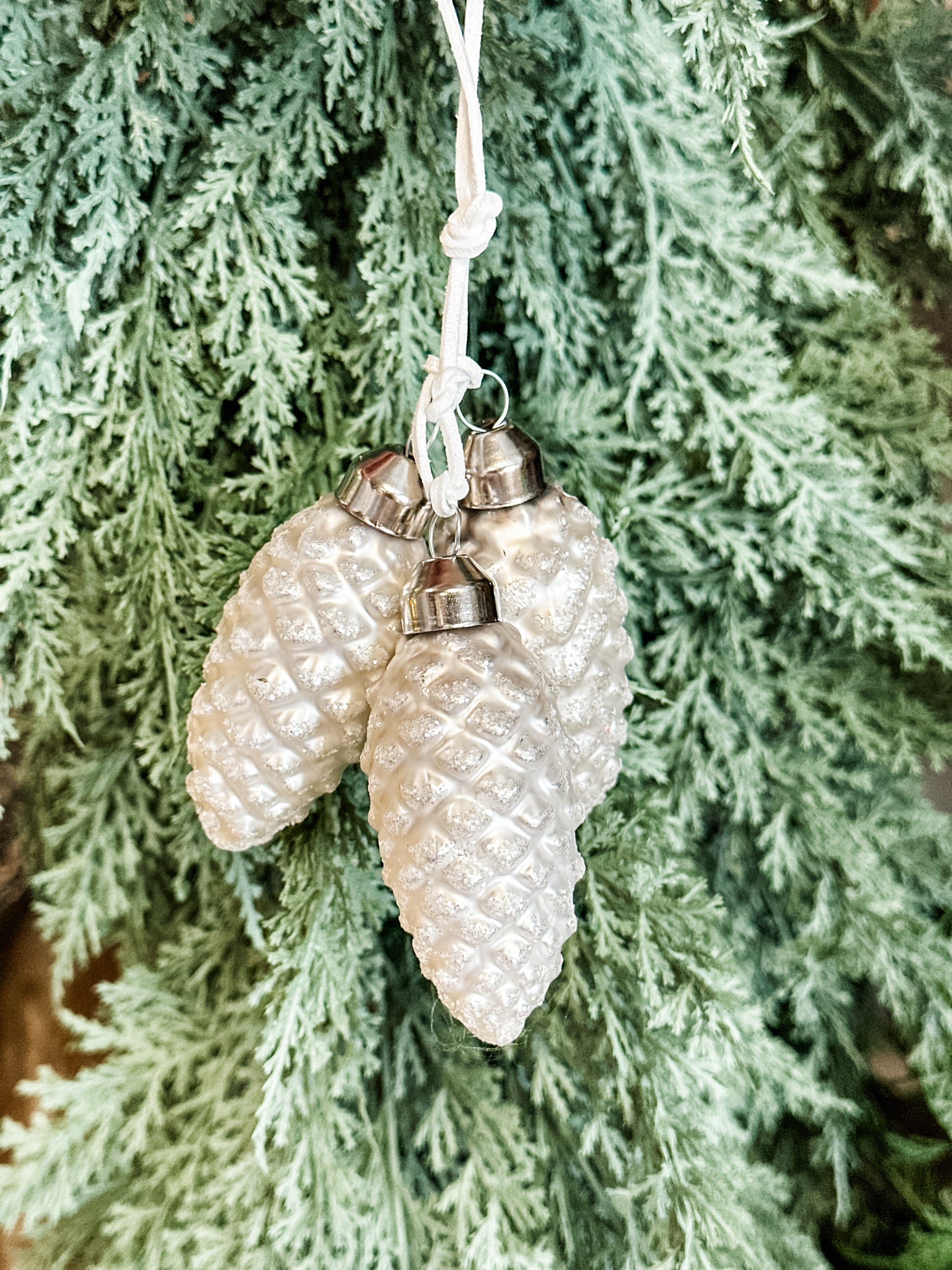 white pinecone cluster ornament with glitter at The Rustic Barn in Killingworth CT