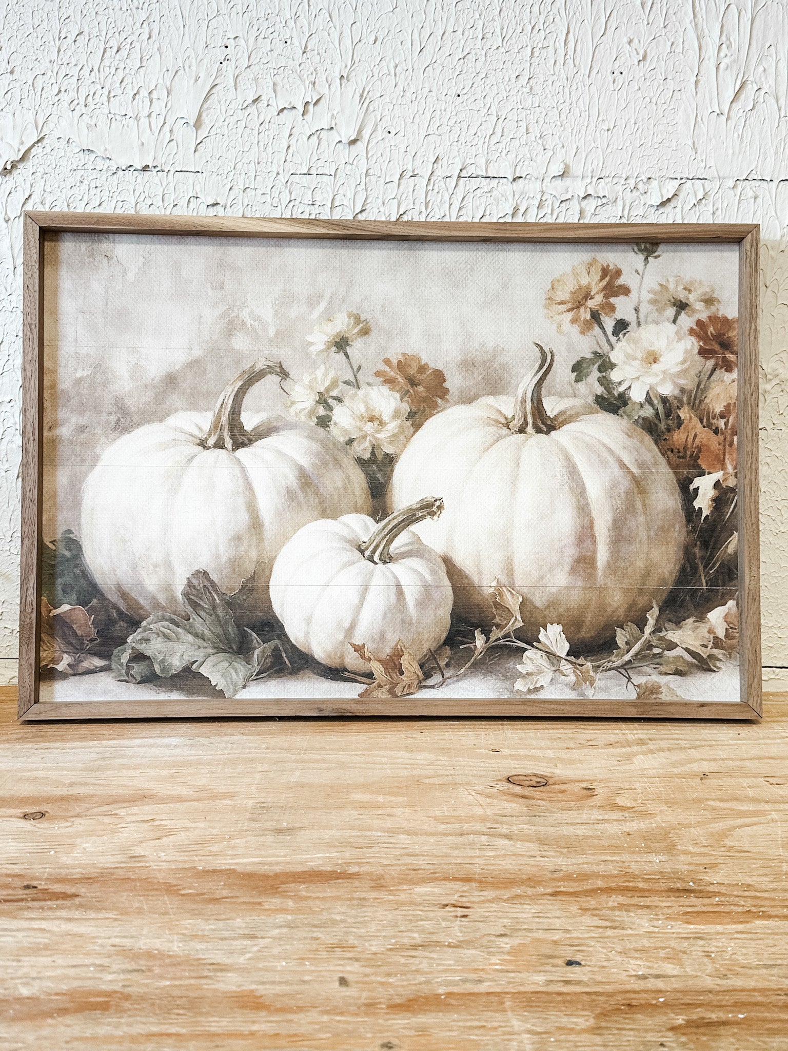 white pumpkins and autumn florals wooden framed fall wall art at the rustic barn in killingworth ct