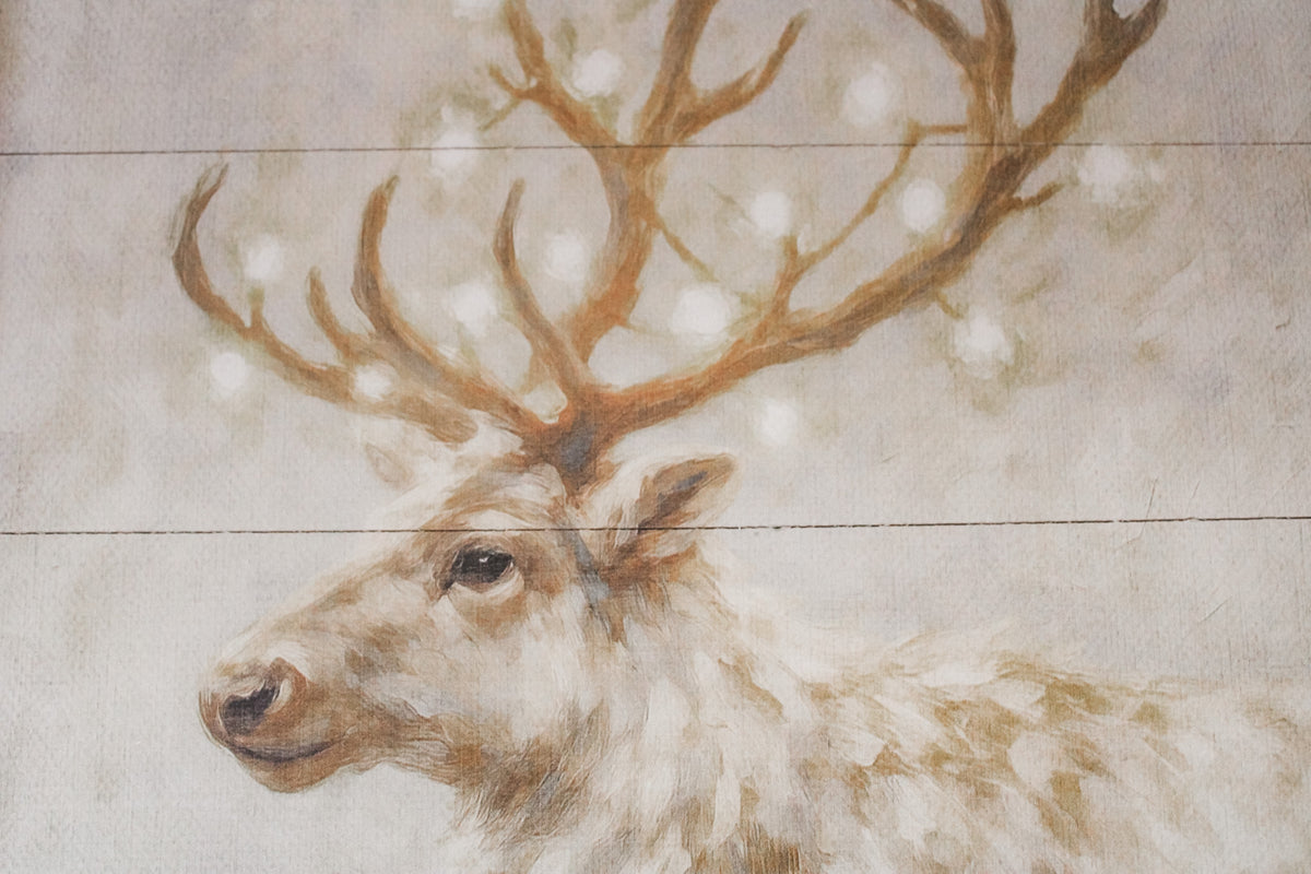 White reindeer for christmas in snowy winter wonderland scene for christmas framed wall art for sale at the rustic barn in Killingworth, CT
