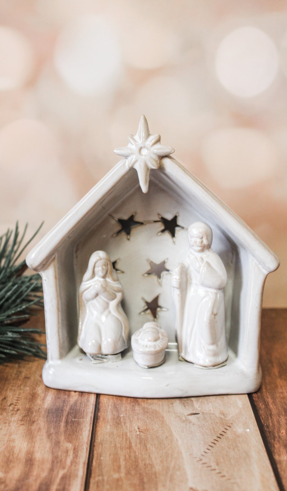 white snoneware holy nativity tea light holder scene with star cutouts for christmas for sale at the rustic barn in Killingworth, CT