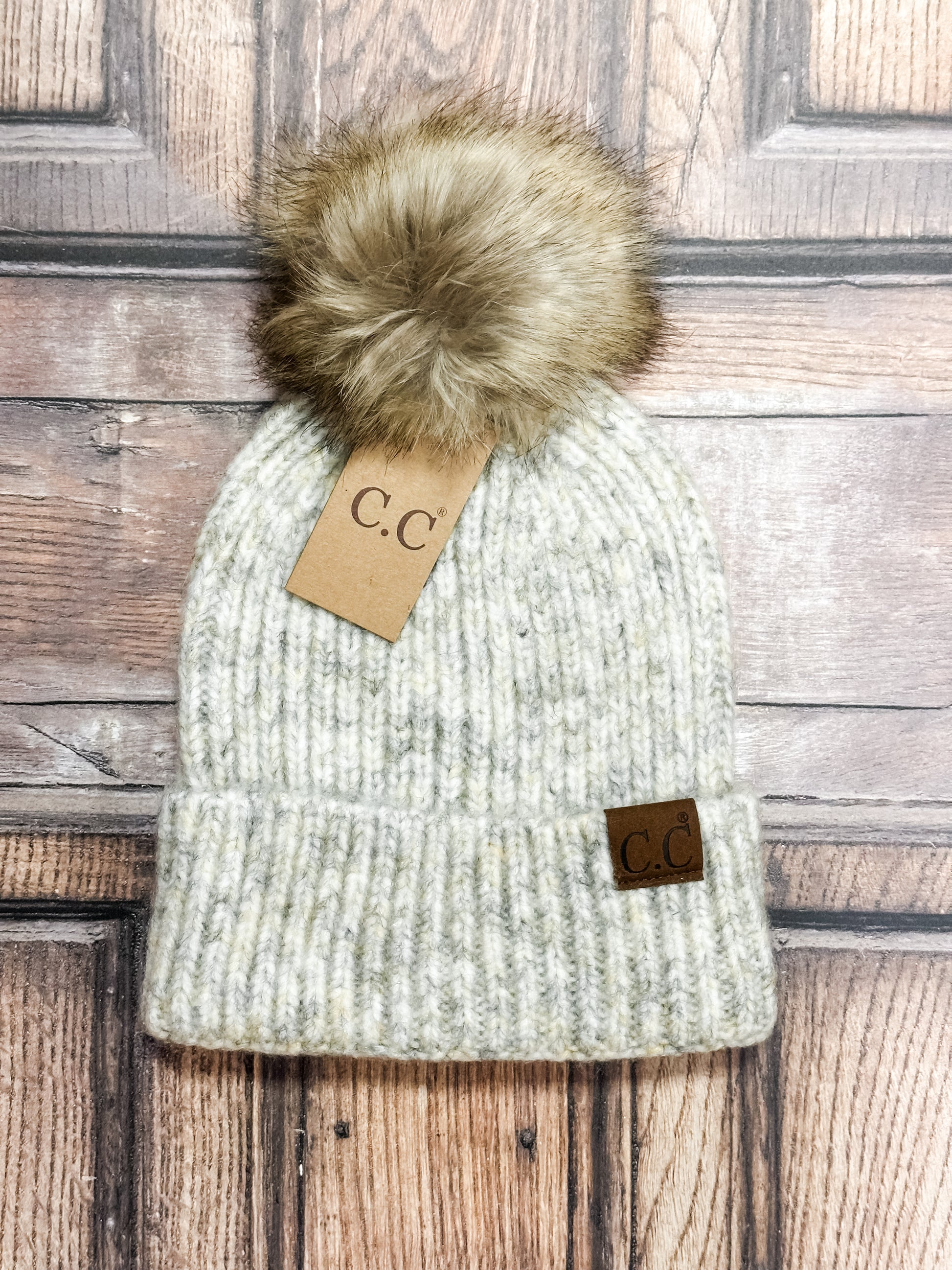 classic winter beanie hat with faux fur pom at The Rustic Barn in Killingworth CT