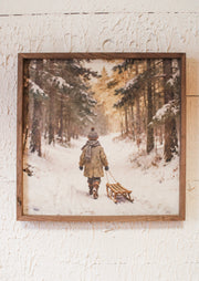 Winter memories wall art print of boy walking the snow with a sled and snowy scene for christmas for sale  at the rustic barn in Killingworth, CT