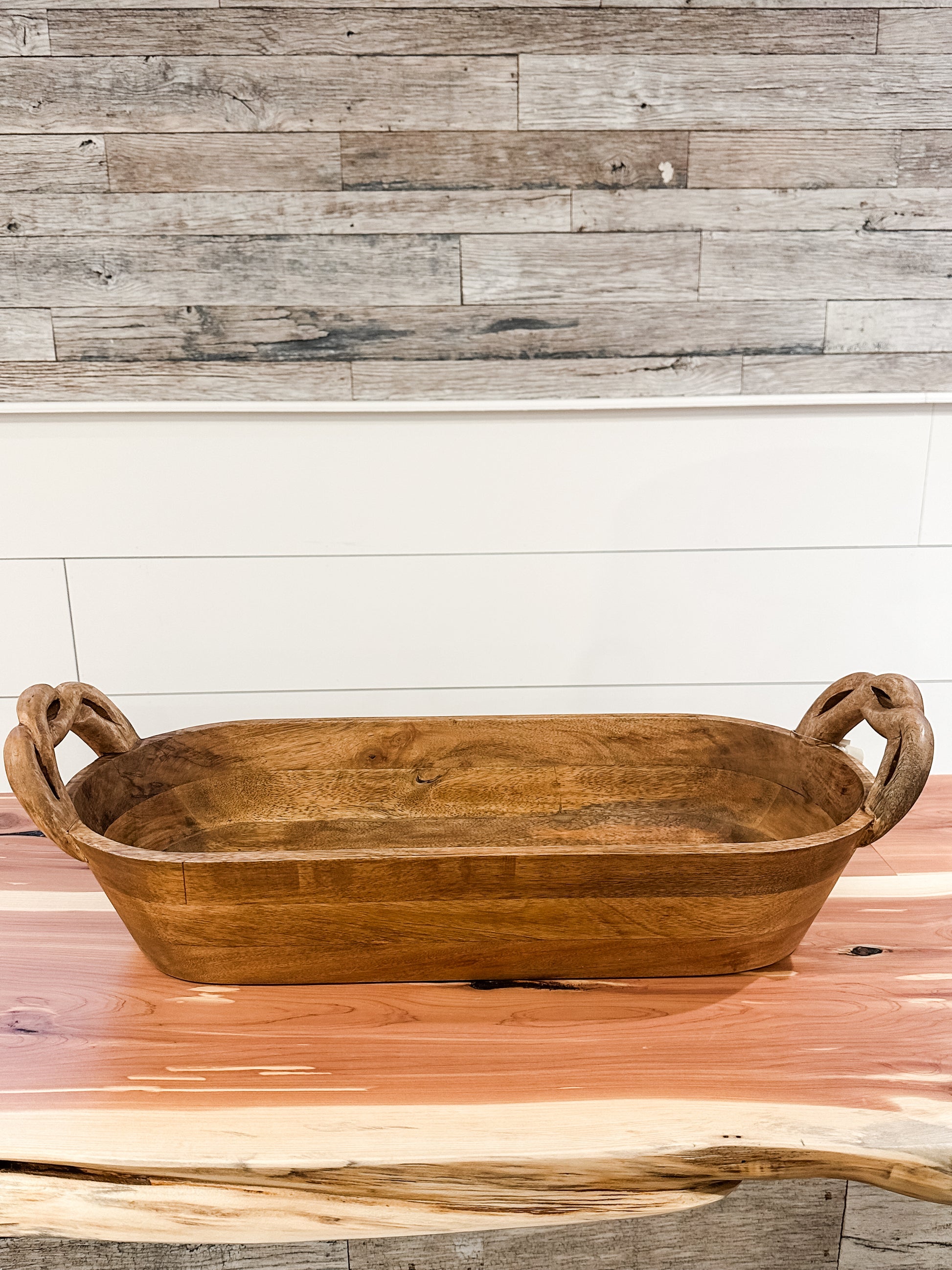 wood dough bowl with twisted handles at the Rustic Barn in Killingworth, CT