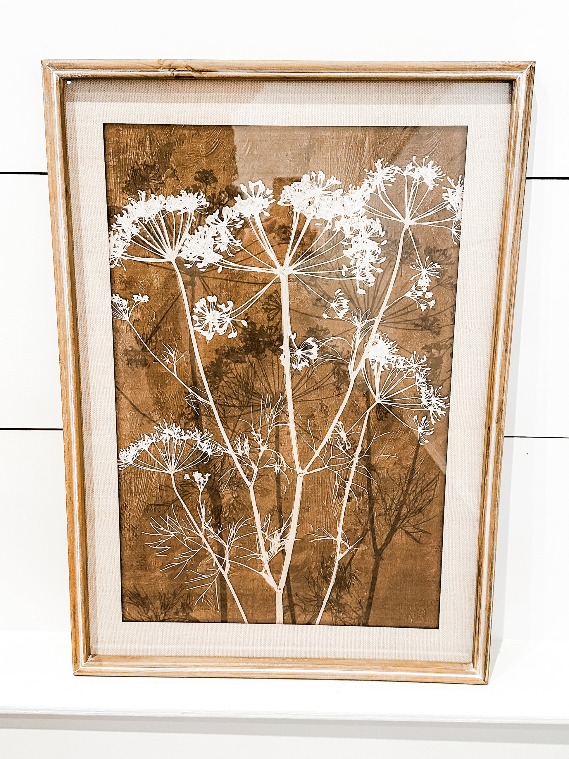 wood framed botanical wall art at The Rustic Barn in Killingworth, CT