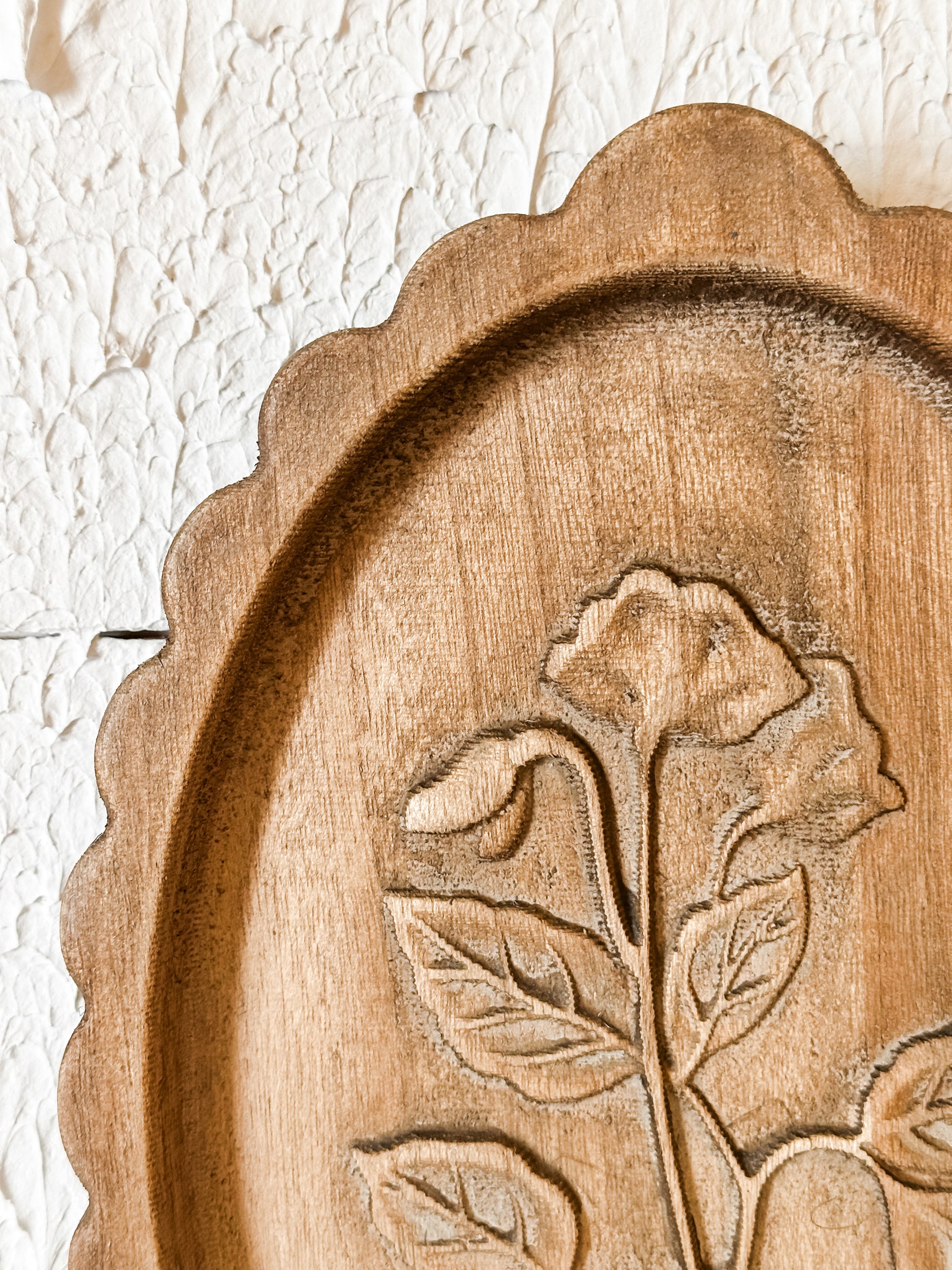 wood scalloped wall decor with laser etched botanicals at the Rustic Barn in Killingworth CT