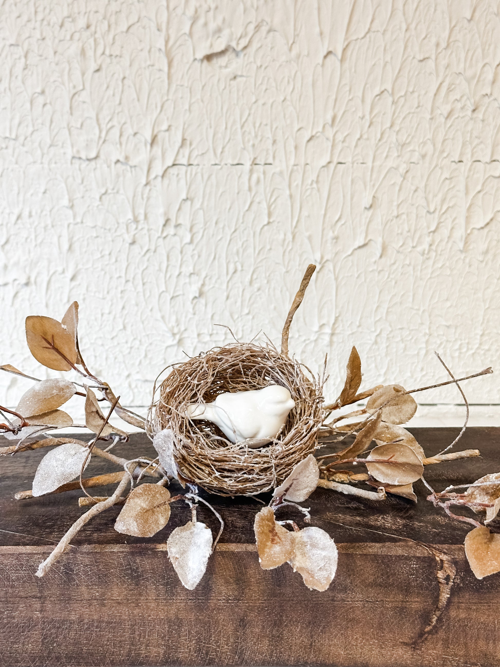 woven birds nest with icy leaves and twigs at The Rustic Barn in Killingworth CT