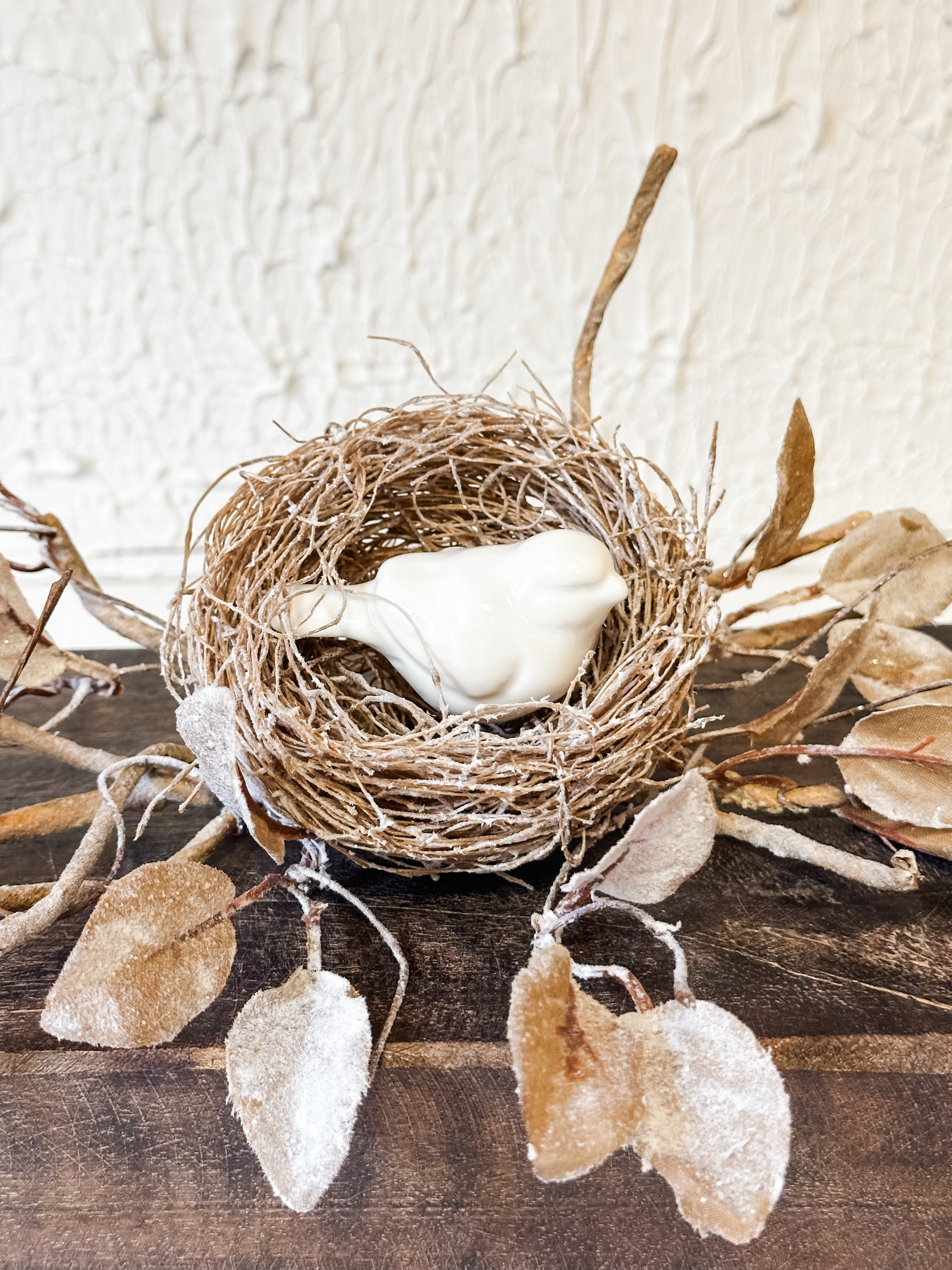 woven birds nest with icy leaves and twigs at The Rustic Barn in Killingworth CT