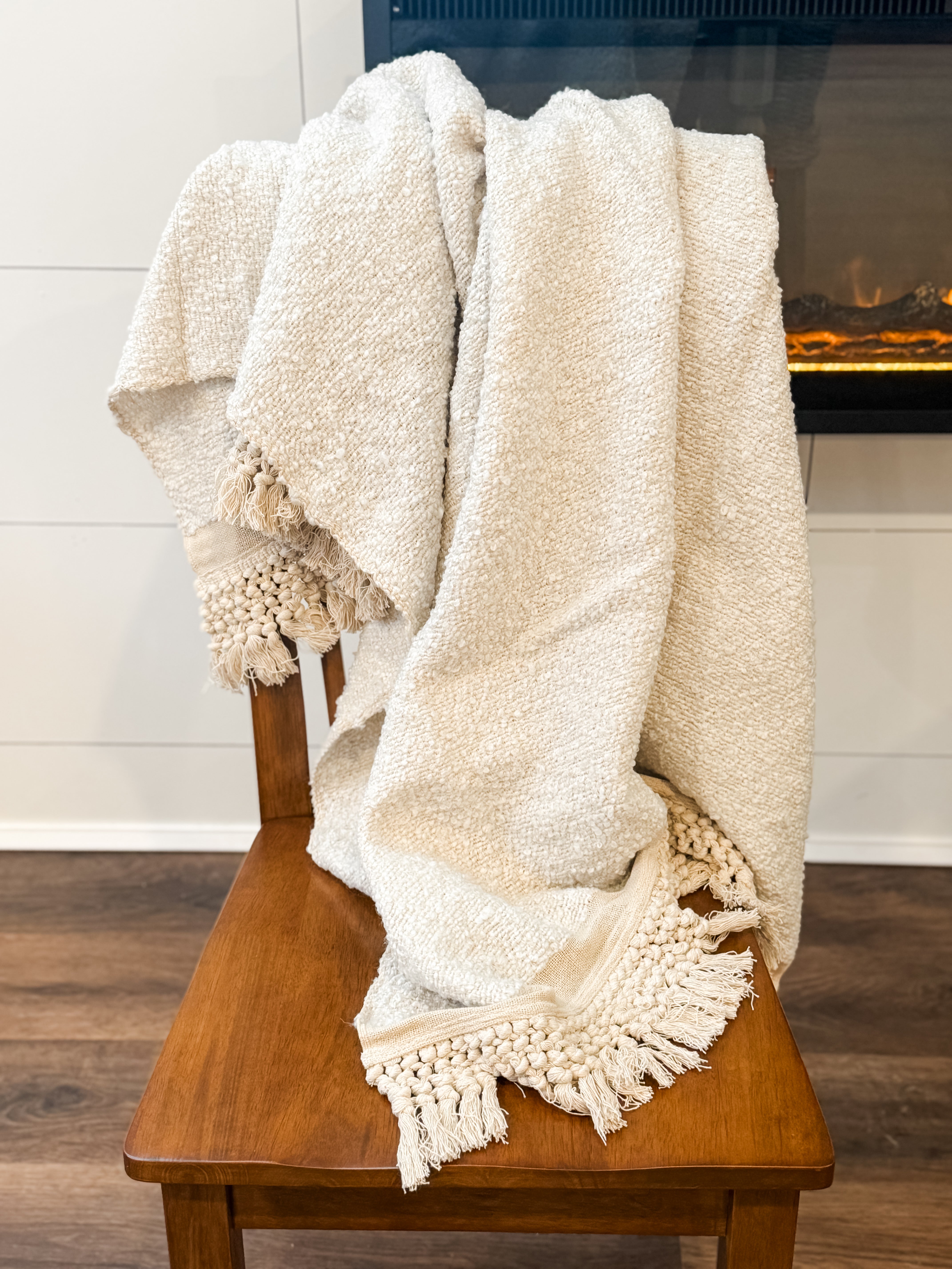 women boucle throw blanket with tassel fringe at The Rustic Barn in Killingworth, CT