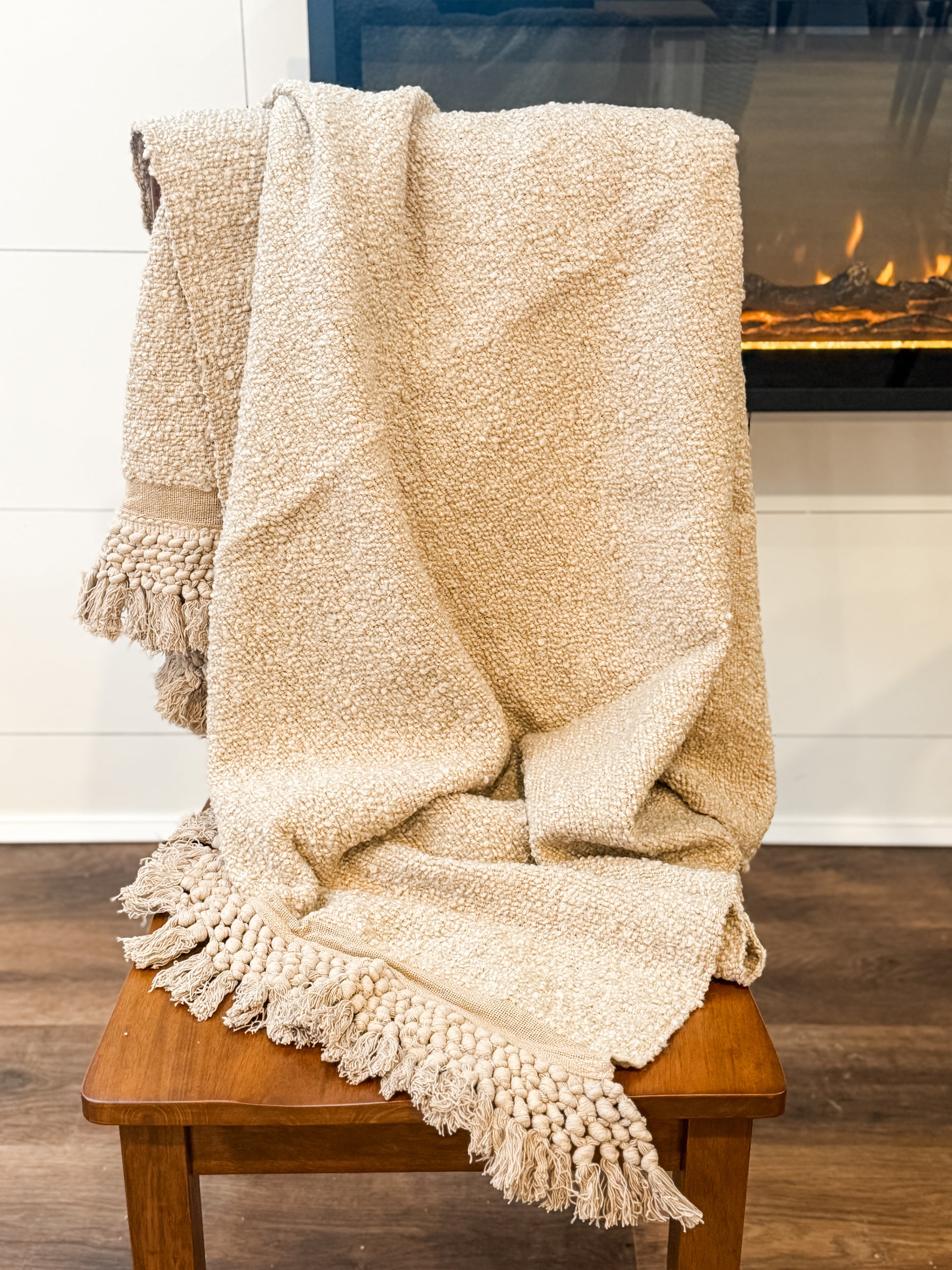 women boucle throw blanket with tassel fringe at The Rustic Barn in Killingworth, CT