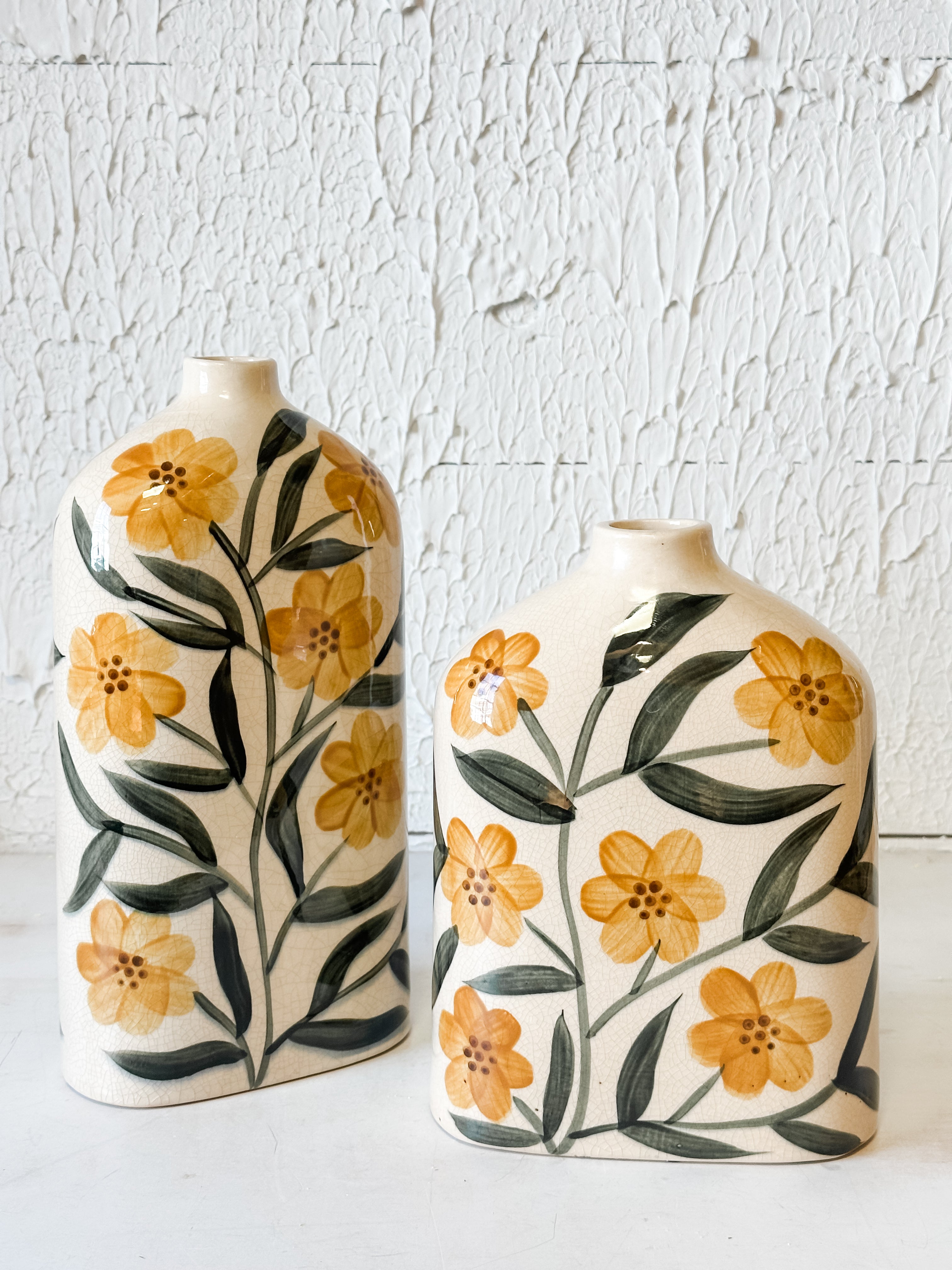 ceramic yellow flat vase with floral design at the Rustic Barn in Killingworth, CT