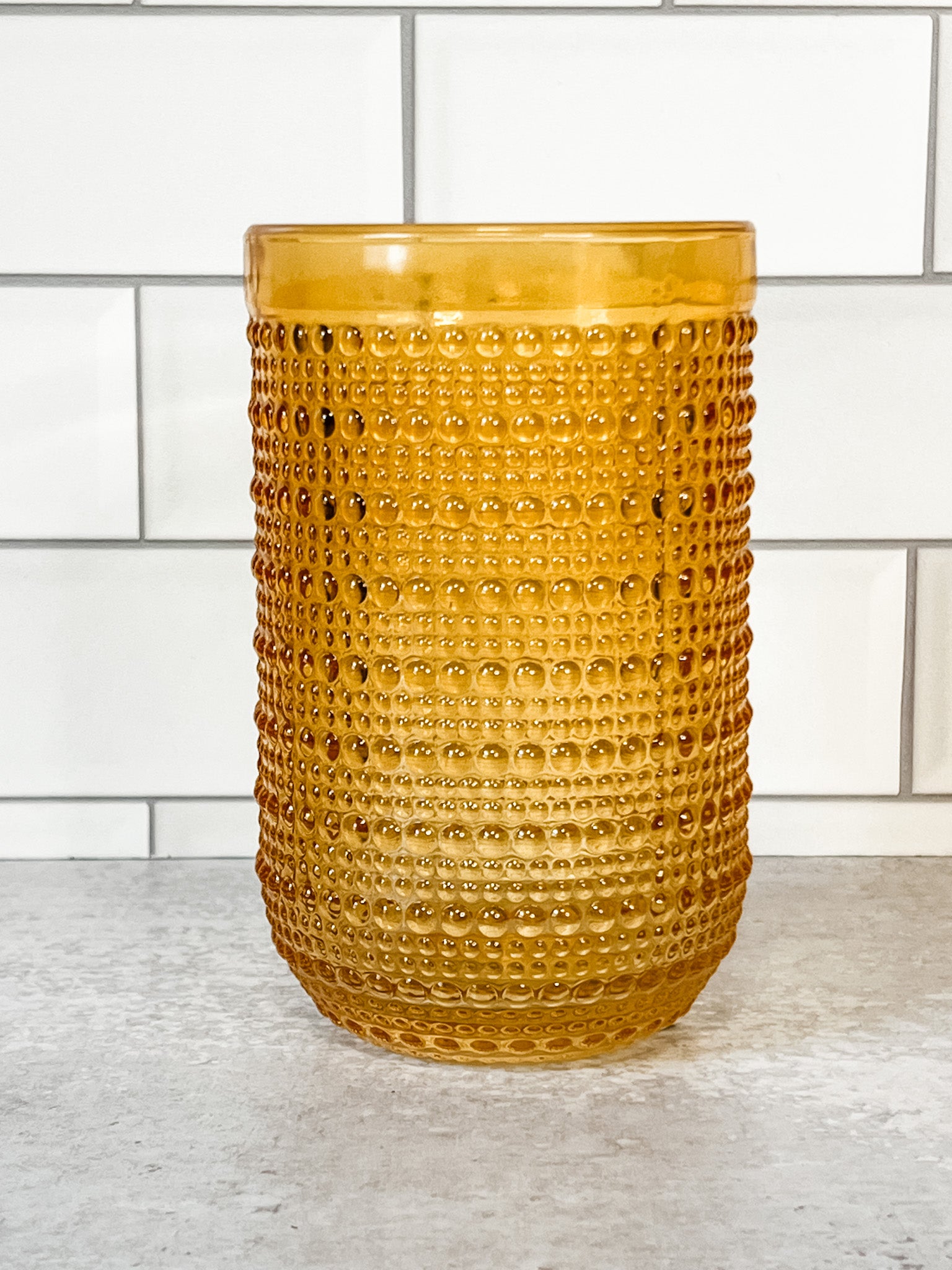 yellow hobnail drinking glasses at the rustic barn in killingworth ct