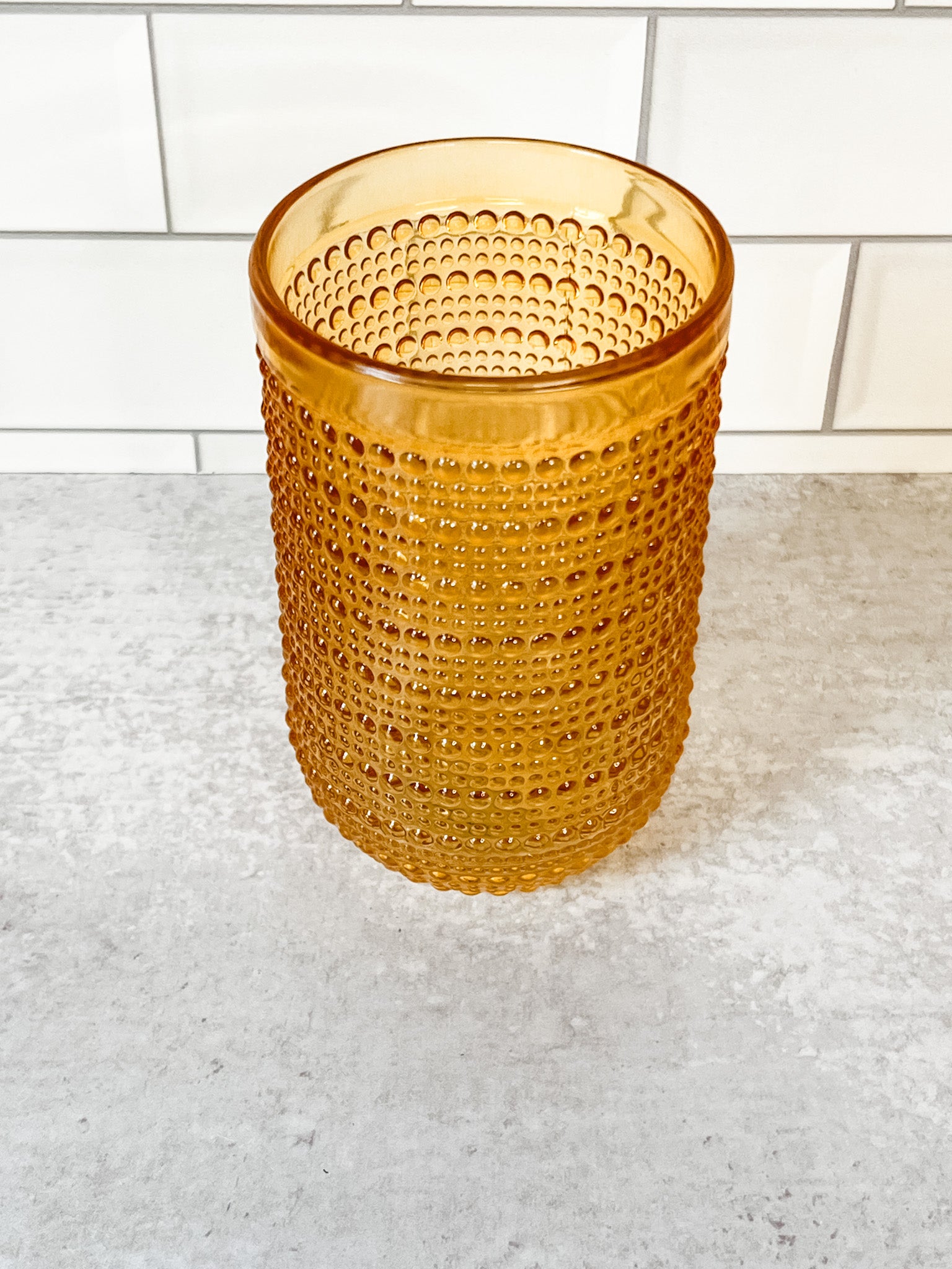 yellow hobnail drinking glasses at the rustic barn in killingworth ct