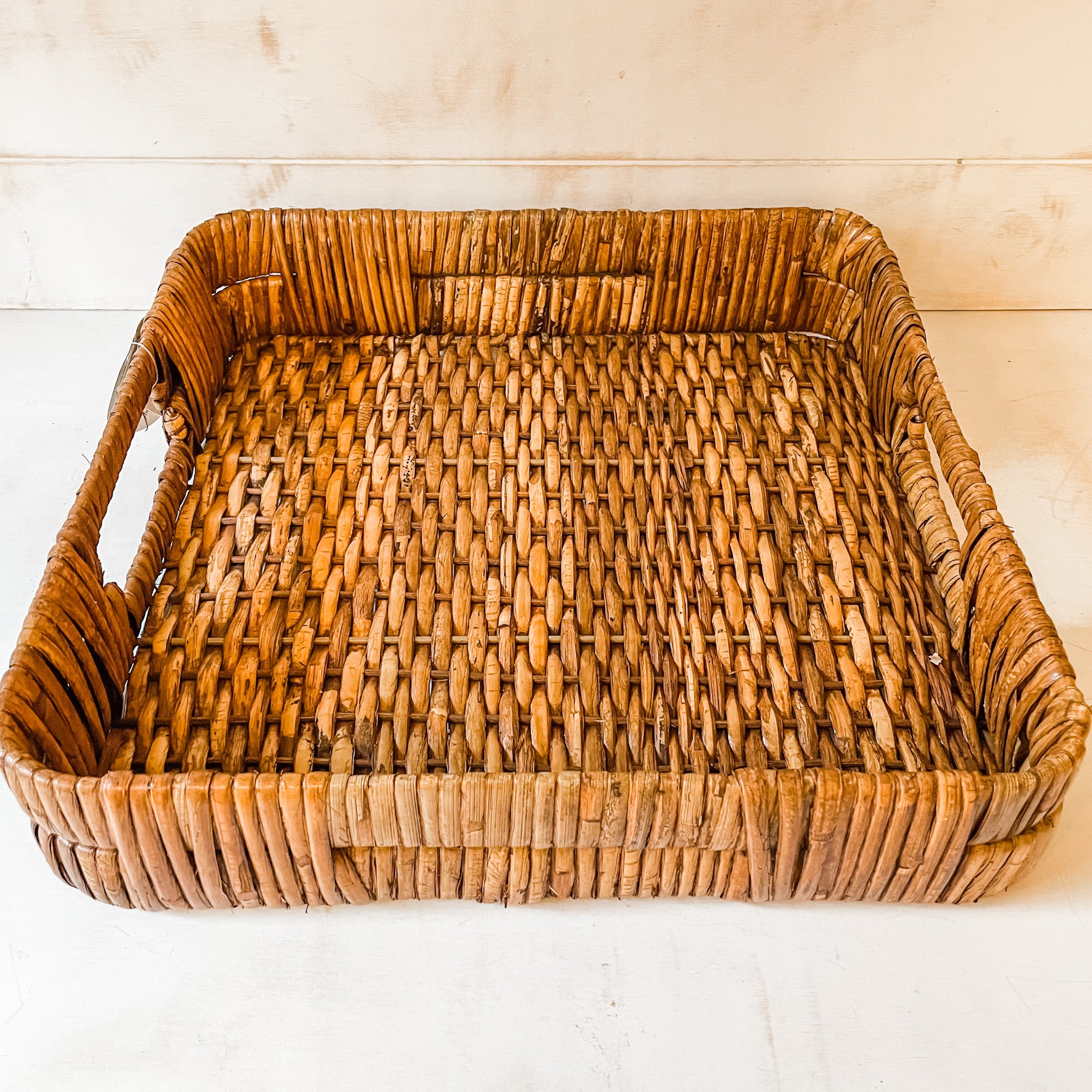 https://therusticbarnct.com/cdn/shop/products/Rattan-square-natural-farmhouse-tray-with-handles-the-rustic-barn-ct-4.jpg?v=1657758301
